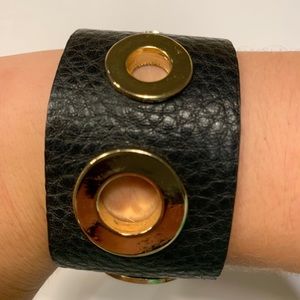 Black leather cuff bracelet with Gold tone detail